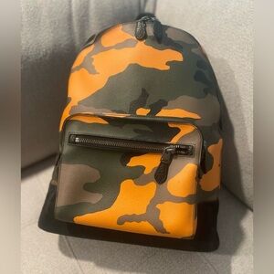 COACH WEST BACKPACK WITH CAMO PRINT F28310
TANGERINE MULTI/BLACK ANTIQUE NICKEL